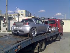 Автомобиль Smart roadster на платформе эвакуатора ТАТА