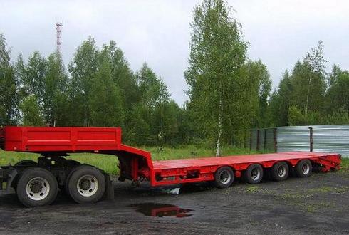 Низкорамный эвакуатор для перевозки спецтехники